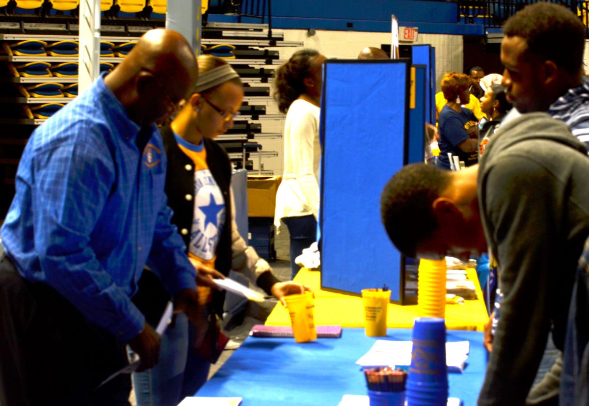 Nathaniel Denu Director of Recruiting and Lab Instructor talks to students thinking about majoring in Engineering at High School Preview Day held at F.G. Clark Activity Center on Saturday November 14.