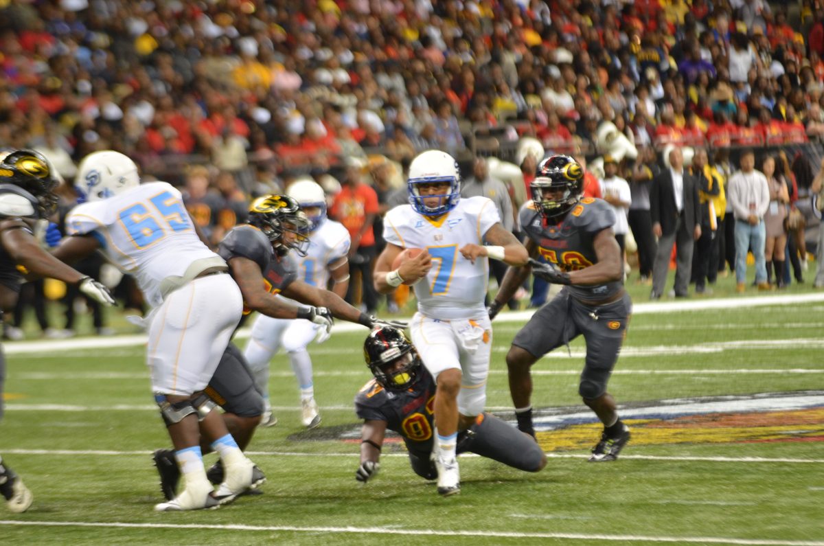 Sophomore quarterback Austin Howard avoids the sack for extra yardage during the 42nd Annual Bayou Classic on Saturday, November 28.