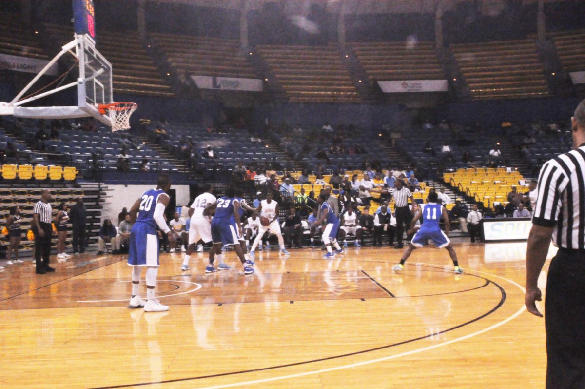 Redshirt Sophomore Chris Thomas sets up the offense during the Jaguars matchup against Dillard University on Tuesday, November 17 in F.G. Clark Activity Center.