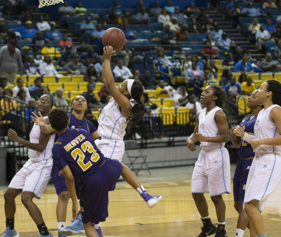 Freshman Guard, Danayea Charles attempts a layup over Alcorn State dfenders in saturdays game at F.G Clark Activity Center.