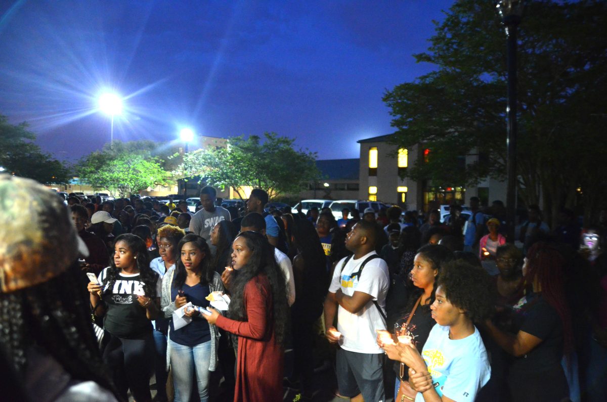 Southern University students gather in front of the Student Union for the candle lighting ceremony for our fallen Jags Lashuntae Belton and Annette January on April 12.