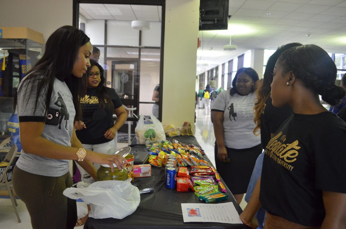 Members of the Collegiate 100 held a snack shack in the Student Union on April 20.