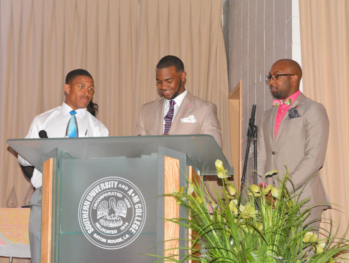 Seniors Lenard Tillery and Keith Morgan II announce the winner for athlete of the year at the SU Girls Rock award show on Wednesday March 30 in the Cotillion Ballroom