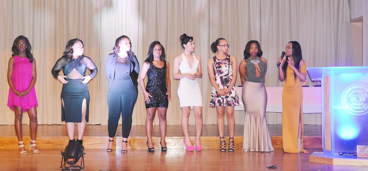 Members of the Association for Women Studies introduce themselves to the audience after the SU Girls Rock award show on Wednesday March 30 in the Cotillion Ballroom.