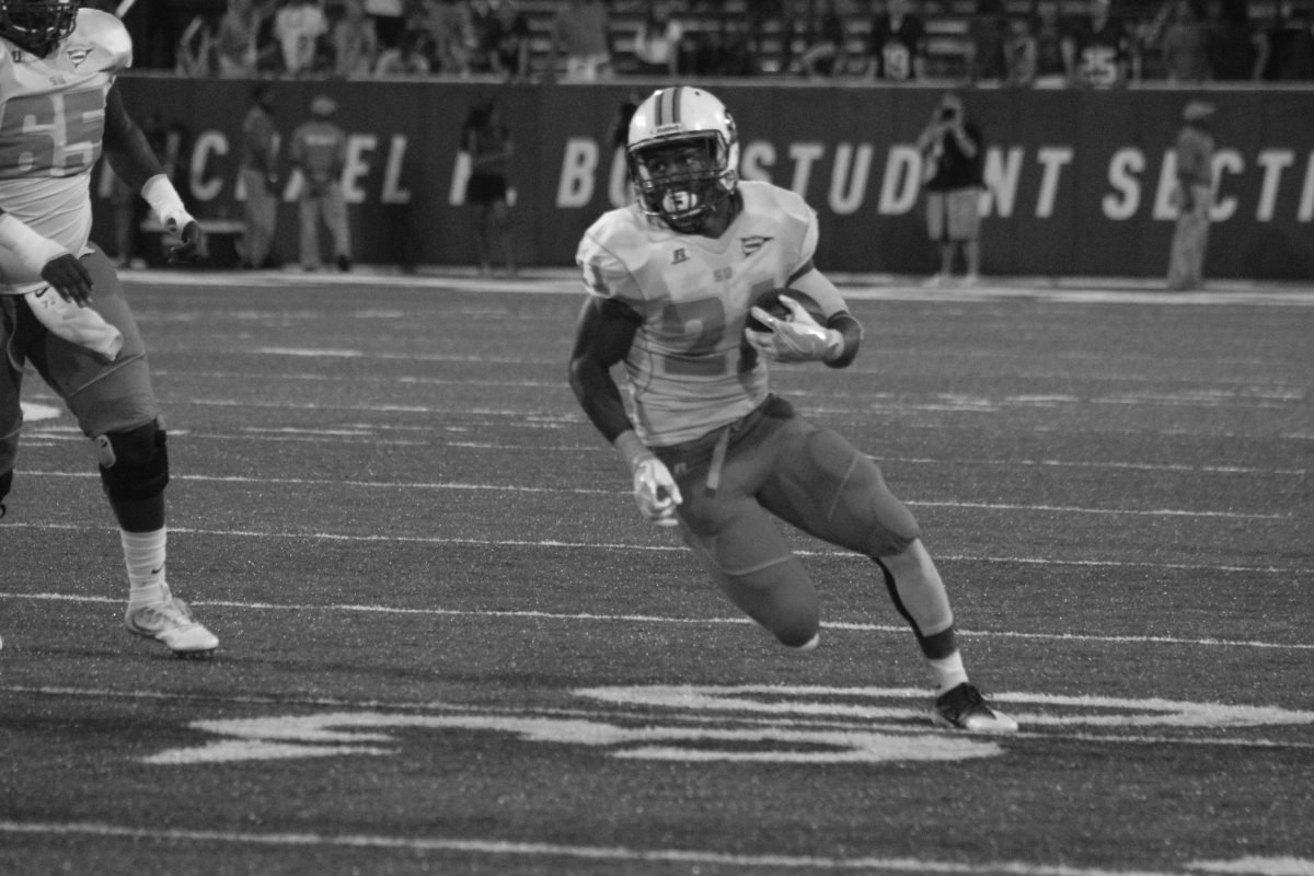 Southern University Senior running back Lenard Tillery hustles for yardage during the game against Tulane on Saturday, September 10 in Yulman Stadium. TIllery only netted 39 rushing yards against a swarming Greenwave defense.