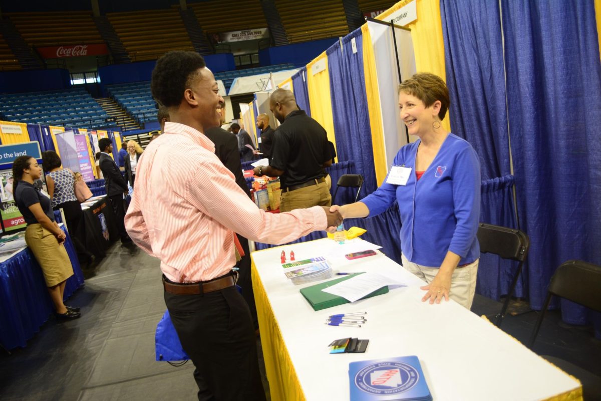 Gerren Smith, a Junior Civil Engineering major from New Orleans, chats with a potential&#160; employer during the 2016 Fall Career Fair held on Wednesday, September 21, in the F.G. Clark Activity Center.
&#160;