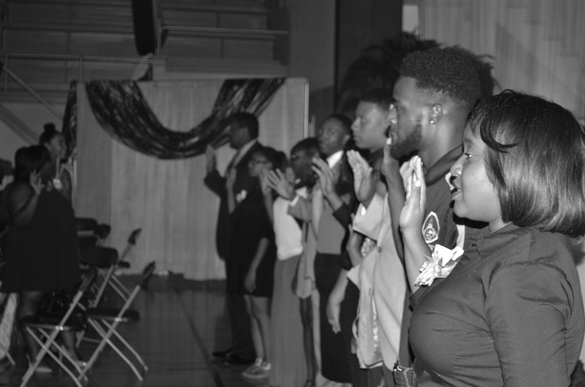 Student Government Association leaders reciting their oath during the state of SGA address in the event center on september 14.