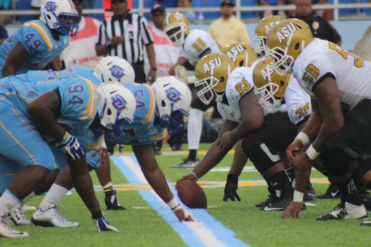 SUBR and ASU lineman ready themselves as they await for the snap to start the down.