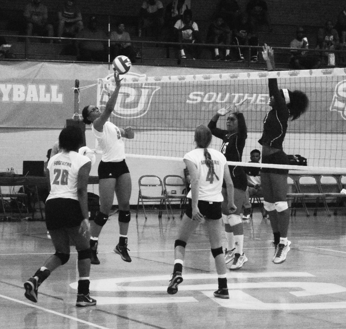 Freshman middle blocker Arabella Hall tips ball over the net aginst Alabama A&amp;M Bulldogs during vollyball game held in Seymore on September 16.