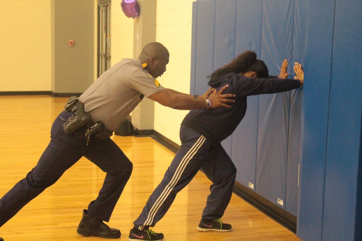 &#160;
BRPD officer Sgt. Riley Harbor, III demonstrates a defense technique during the &#8220;Fight for you life&#8221; event held on Tuesday, October 4.