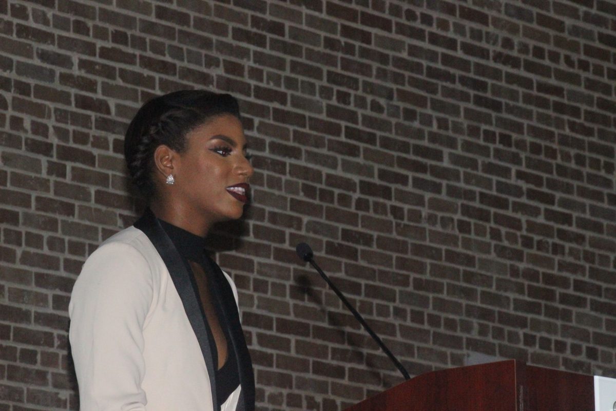 Junior Business Marketing major, Darb Smith speaks during Black and White&#160; Affair held&#160; on November 10 in the Event center.