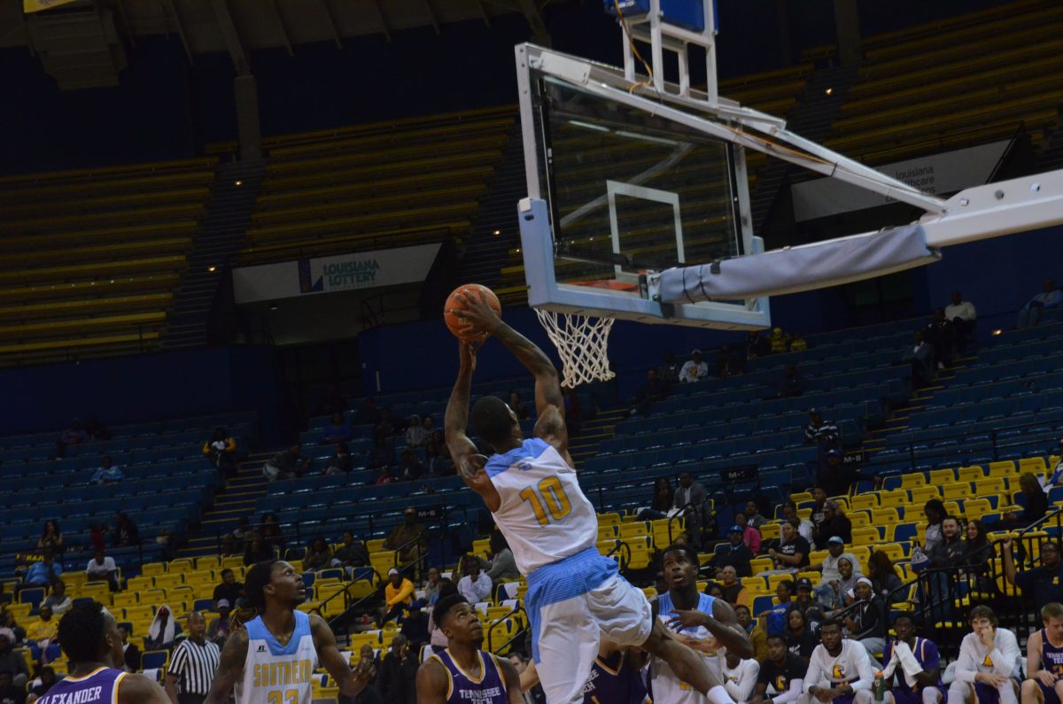 Senior forward Shawn Prudhomme goes up for a basket against Tennessess Tech defenders. Prudhomme is averaging 18.5 ppg and currently ranks second in scoring in the SWAC.&#160;