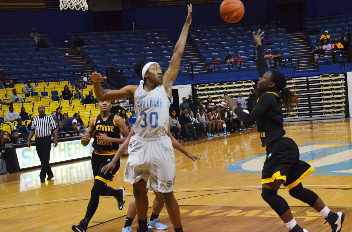 Senior guard Cortnei Purnell block a shot attempt during Southen&#8217;s matchup versus Bethune-Cookman on November 22 at the Southern University Mini Dome.