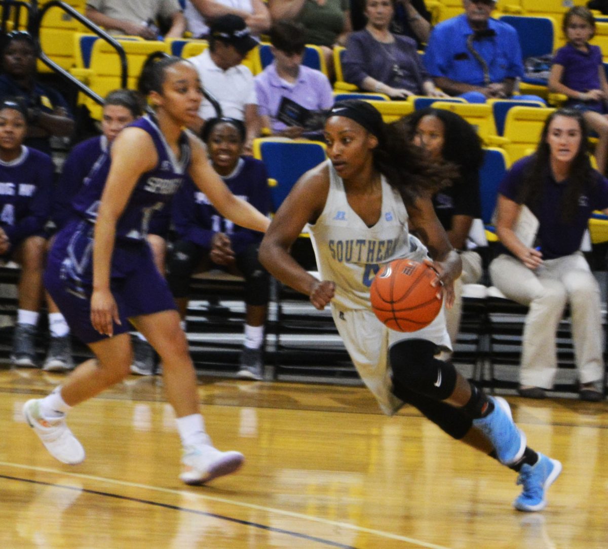 Sophmore guard Skylar O'Bear drives the ball to the basket during the basketball game against Spring Hill on Saturday, November 12, in F.G. Clark Activity Center.