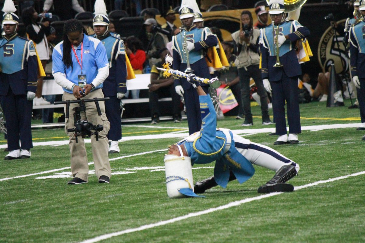 The Southern University Human Jukebox drum major, Brendon&#160; &#8220;The MVP&#8221; Guerin, executes the signature backbend during&#160; halftime of the 43rd Bayou Classic.