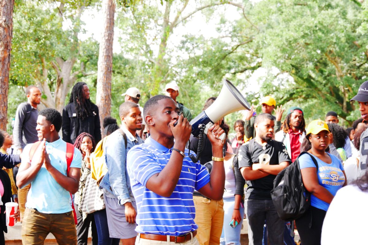 Sophomore class president, Anthony Kenny, announcing the Mannequin Challenge held on Pretty Wednesday, November 9 behind the Smith-Brown Memorial Union.