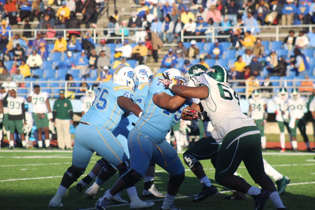 Offensive Lineman, Anthony Mosley, pushes through Delta Devils defenders during home game against Mississippi Valley State on Saturday November 19.&#160;