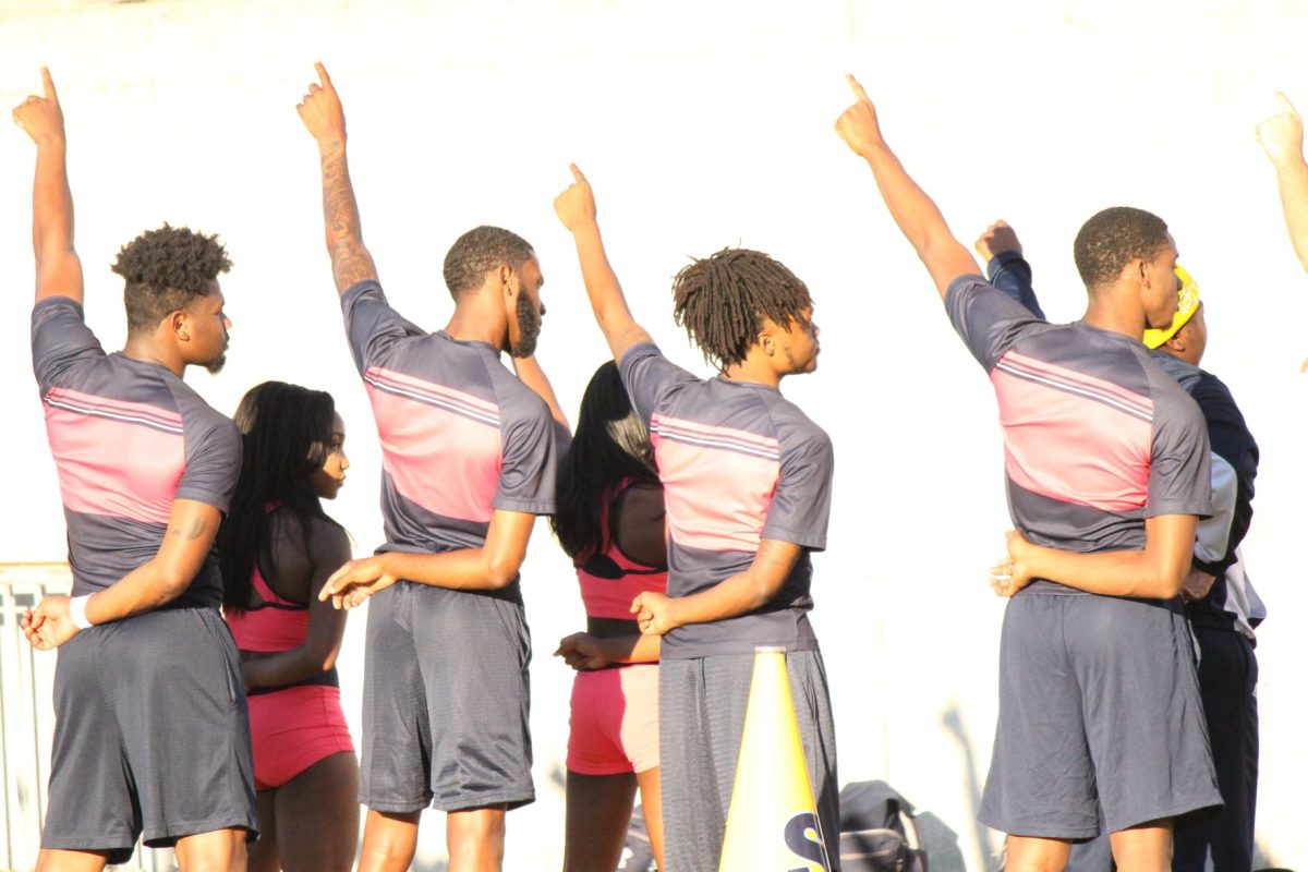 Members of the Southern University cheer squad salute&#160; as the Human Julebox plays their rendition of the the SU alma mater after the game vs. Alcorn State at Jack Spinks field on Saturday, October 29 in Lorman, MS.