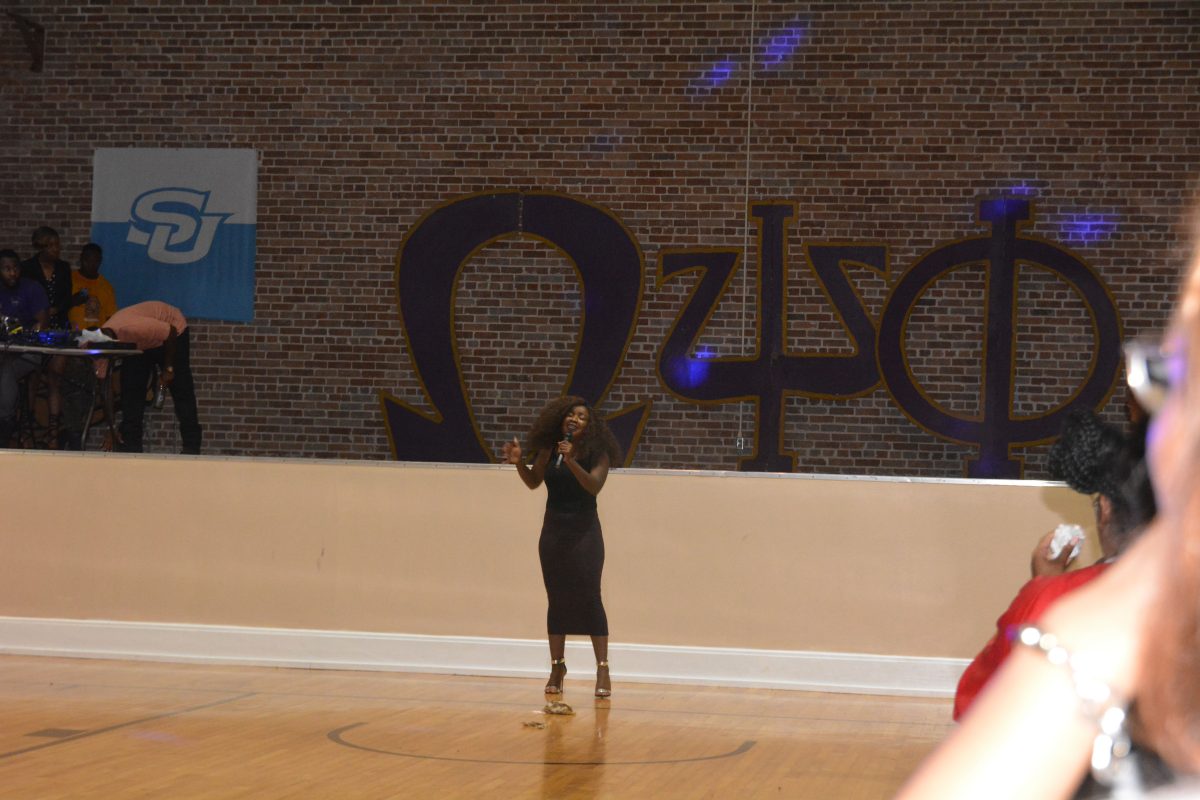 Freshman, Nnonye Sadee, recites her poem for Showtime Apollo event hosted by the Beta Sigma chapter of Omega Psi Phi, Inc. on Tuesday, Novmeber 16&#160;