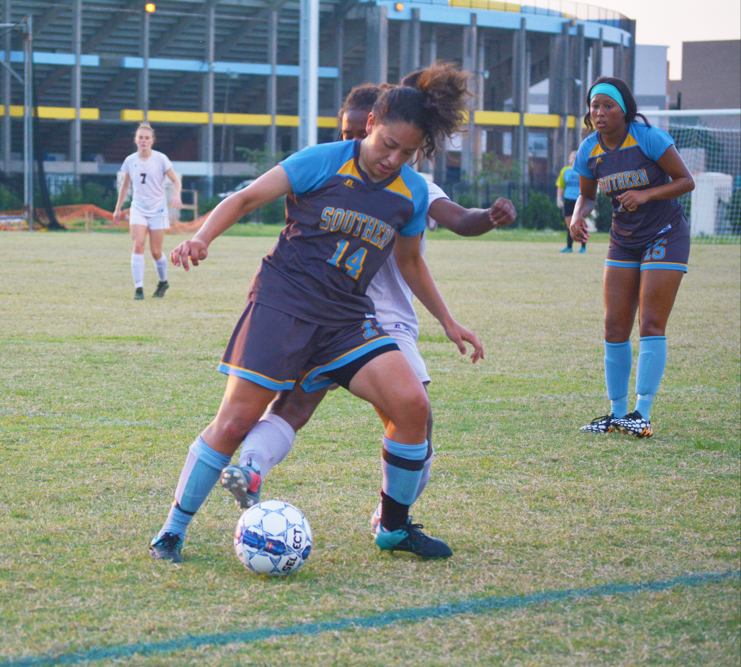 Junior Midfielder, Abby Farias, tries to keep control of the ball over a Texas Southern (TSU) Defender&#160; on Sunday, September 24 at Jaguar Park.&#160;
&#160;