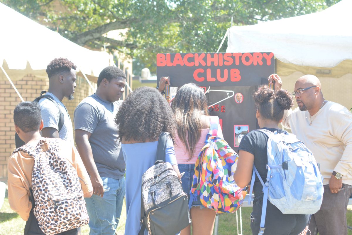 <p>Southern students talking to the Black History club during 