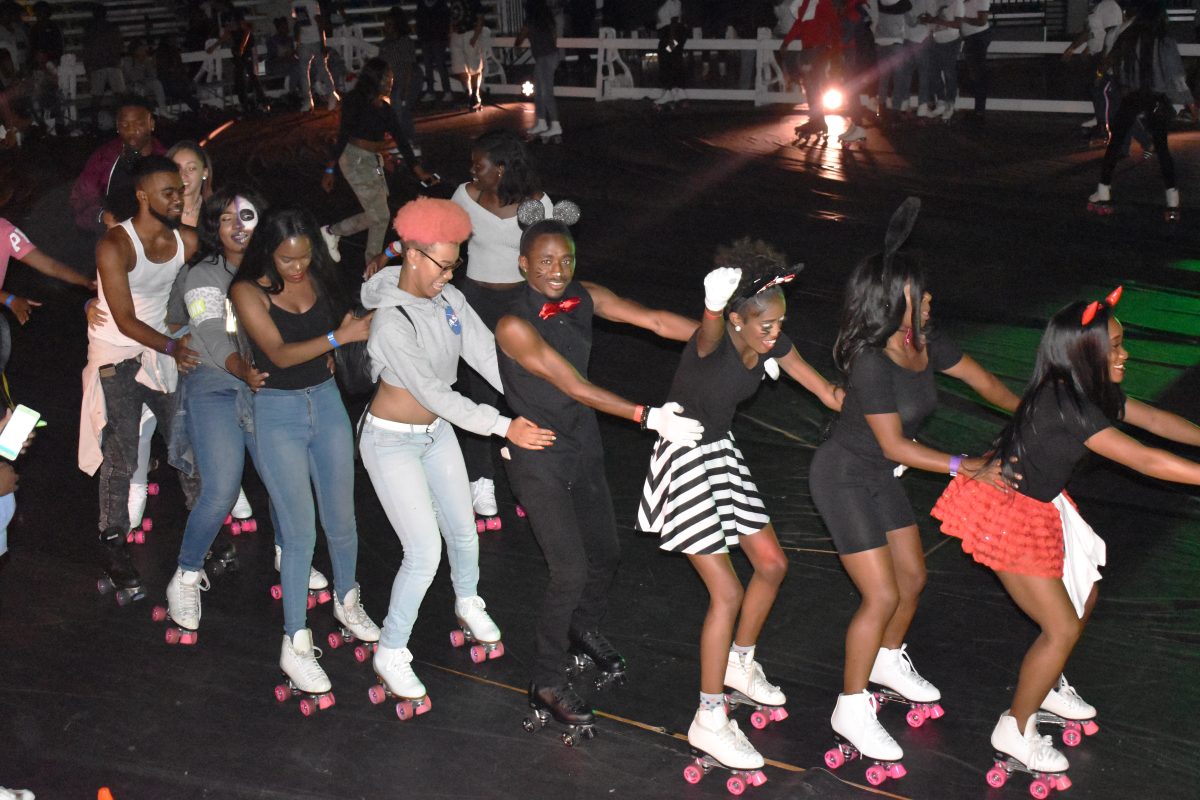 Students make a skate train at Jagscade on Thursday October 26, 2017 in the F.G Clark Activity center (Arnita Dove/DIGEST)