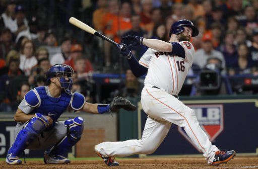 Houston Astros' Brian McCann hits a home run during the eighth inning of Game 5 of baseball's World Series -against the Los Angeles Dodgers Sunday, Oct. 29, 2017, in Houston. (AP Photo/David J. Phillip)