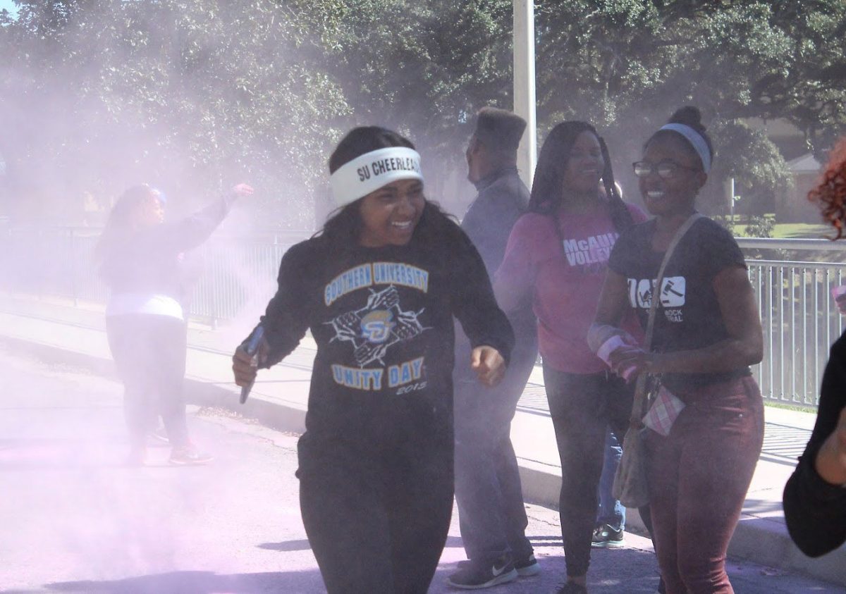 DeNasia Fontenot, Sophomore,Nursing major running for the in Southern University's Color Run in honor of Breast Cancer Awareness Month. held SUnday Oct. 29 in the Residential Circle. (D'Aryn Thomas/DIGEST)