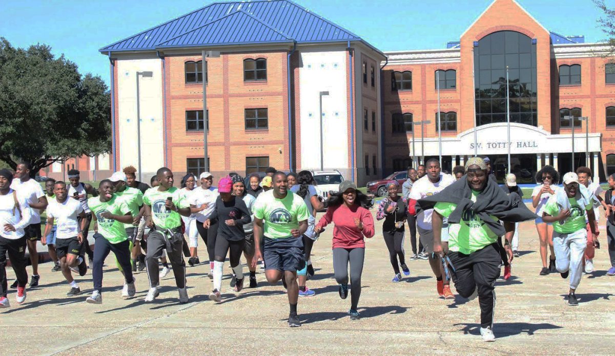 Participants in Southern University's Color Run starting their run in honor of Breast Cancer Awareness Month. held SUnday Oct. 29 in the Residential Circle. (D'Aryn Thomas/DIGEST)