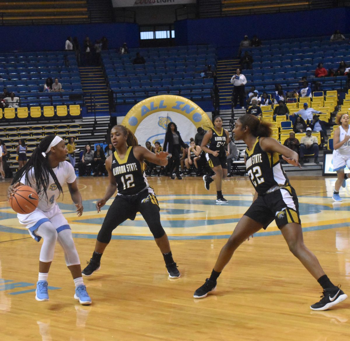 Junior Guard Skylar O'Bear takes on the double team during the Jaguars match against the Alabama State Lady Hornets on January 20 in the F.G. Clark Activity Center.