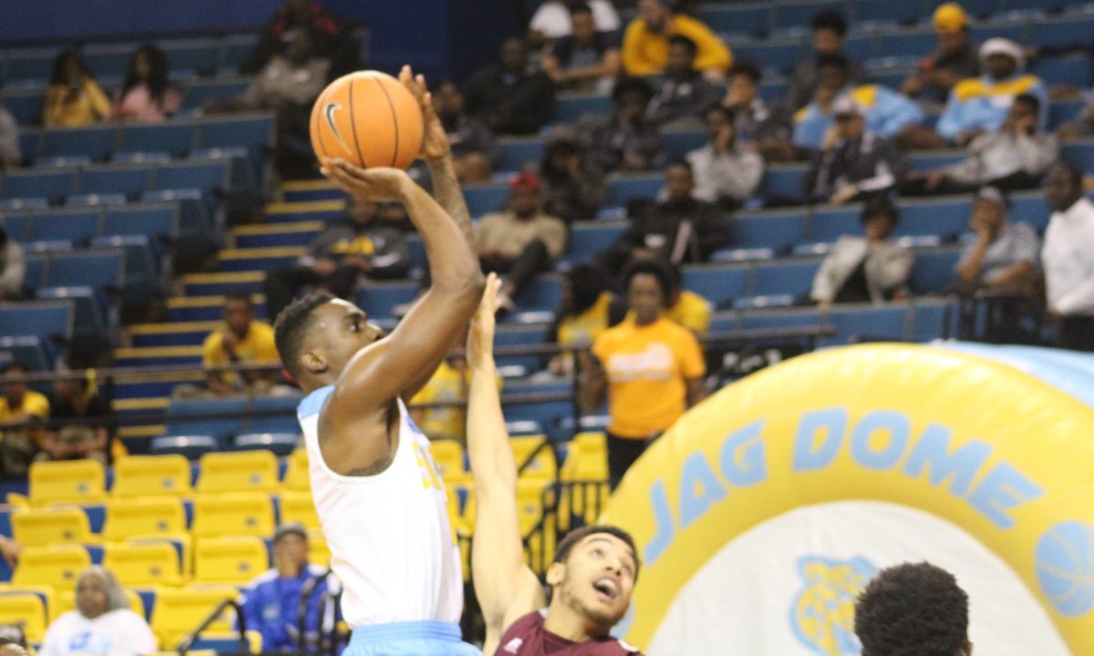 Redshirt Senior, Chris Thomas, elevates over a defender to get a clear shot during Jaguars match against&#160;Alabama A&amp;M&#160;on Monday, January 22 in the F.G. Clark Activity center.&#160;