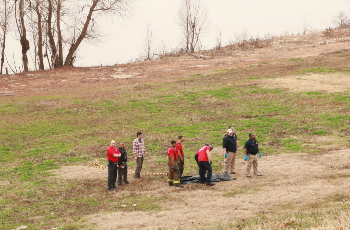 EMS and Coroners carry the body now identified as 51-year-old Yvette Nettles. The body was found in the Mississippi River near rhe campus of Southern University on February 6,2018. (KYNDALL JONES/DIGEST)