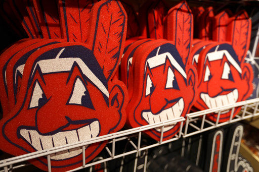 Foam Chief Wahoos line the shelf at the Cleveland Indians team shop, Monday, Jan. 29, 2018, in Cleveland. Divisive and hotly debated, the Chief Wahoo logo is being removed from the Cleveland Indians' uniform next year. The polarizing mascot is coming off the team's jersey sleeves and caps starting in the 2019 season. The Club will still sell merchandise featuring the mascot in Northeast Ohio. (AP Photo/Tony Dejak)