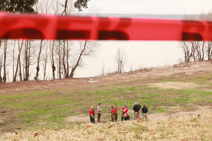 EMS and Coroners carry the body now identified as 51-year-old Yvette Nettles. The body was found in the Mississippi River near rhe campus of Southern University on February 6,2018. (KYNDALL JONES/DIGEST)