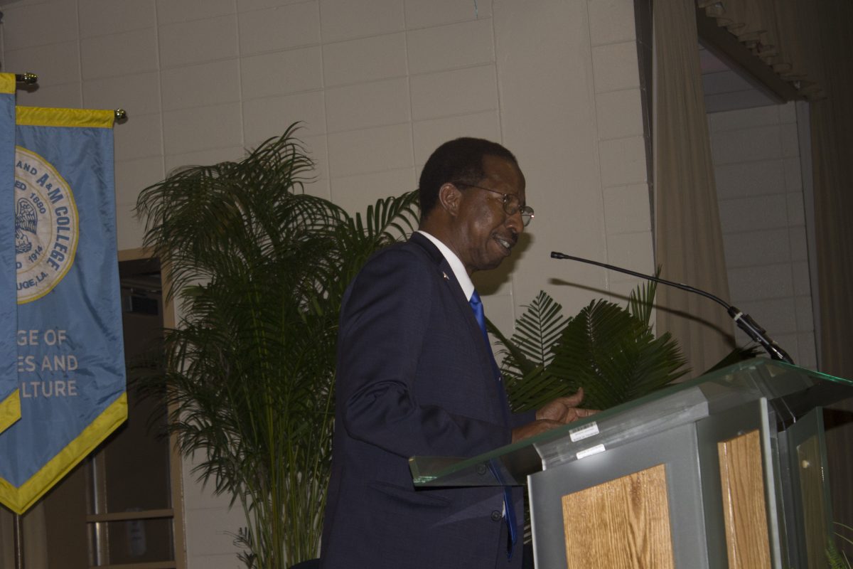 Distinguished Professor of Physics and Dean of the Delores Spikes Honors College, Dr. Diola Bagayoko, introduces the guest speaker at the annual pinning ceremony in the Royal Cotillion Ballroom on March 16th.&#160;