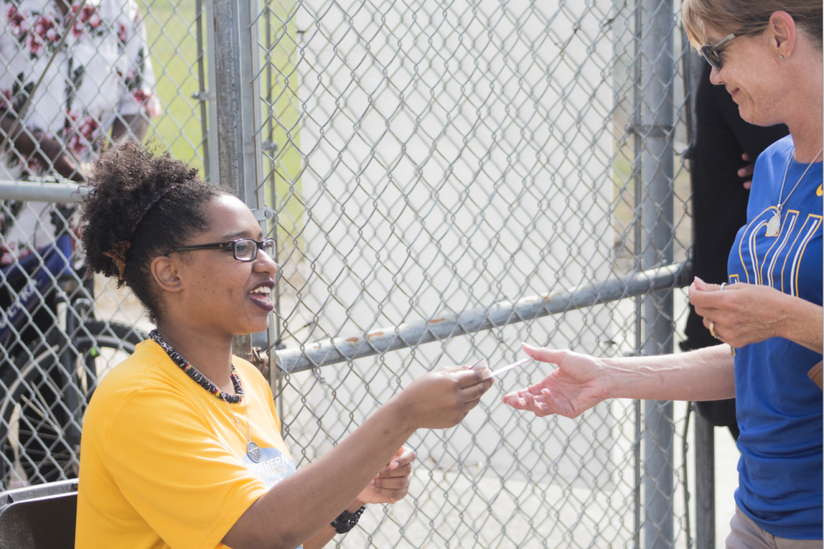 Sophomore, Diamond Girl, Ayanna James, collects tickets at Saturday's SWAC baseball double header against Grambling State on April 21, 2018.
(Devin Hadrick)