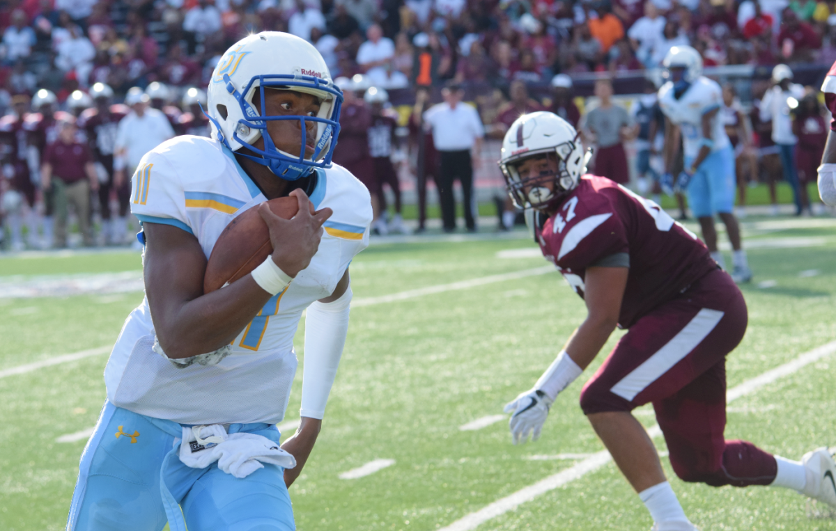 Sophomore, quarterback, John Lampley, breaks for a rush against Alabama A&amp;M during the Gulf Coast Challenge in Mobile, Alabama at Ladd-Peebles Stadium on September 22 (Keith Lewis/ DIGEST)