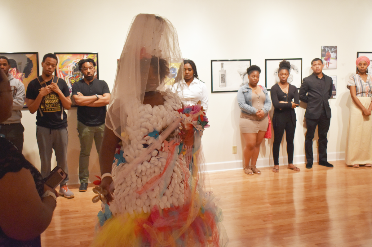 <p>“The Parade of Causes,”  wearable art, a mutil-colored piece created by artist Ursula Clark, was inspired by her and other individuals who’ve had personal battles with health conditions. Each color represents a cause.</p>