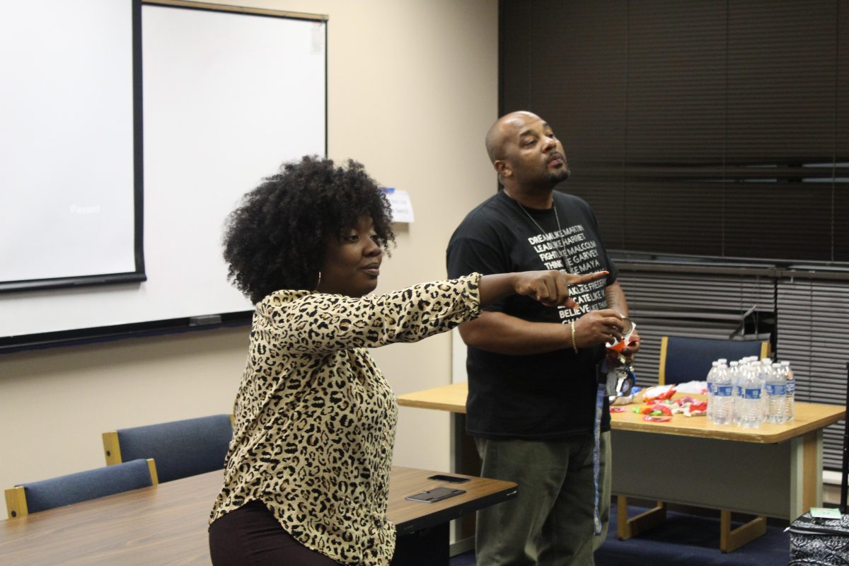 President of the Black History Club Nala Anderson and advisor Eugene Rico Williams listen in as attendees voice their own thoughts and solutions during a screening of When They See Us hosted by the Black History Club and Southern chapter of the NAACP in the John B. Cade Library on September 24 (KEENON GLOVER/DIGEST)