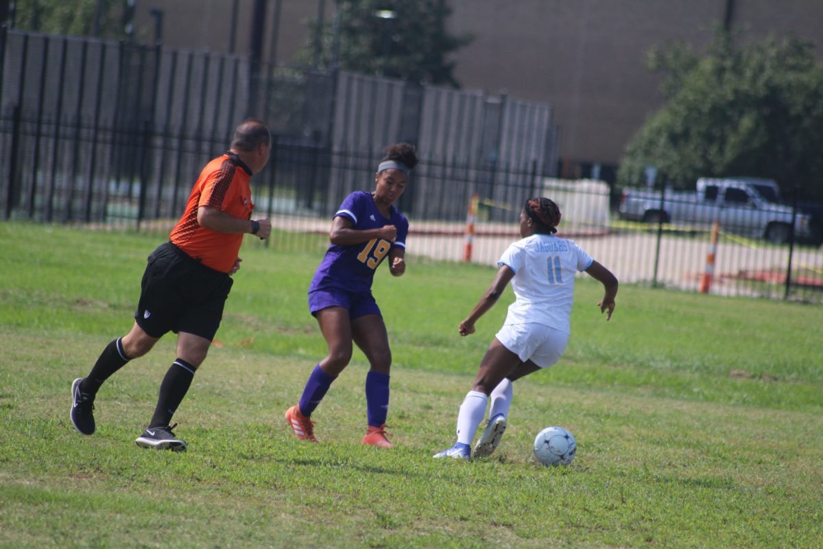 Forward, Lauryn McKinney, dribbles down the field past a Prairie View defender on Sunday, October 14 at Jaguar Park. (Joseph Delaney-McAllister/Digest)