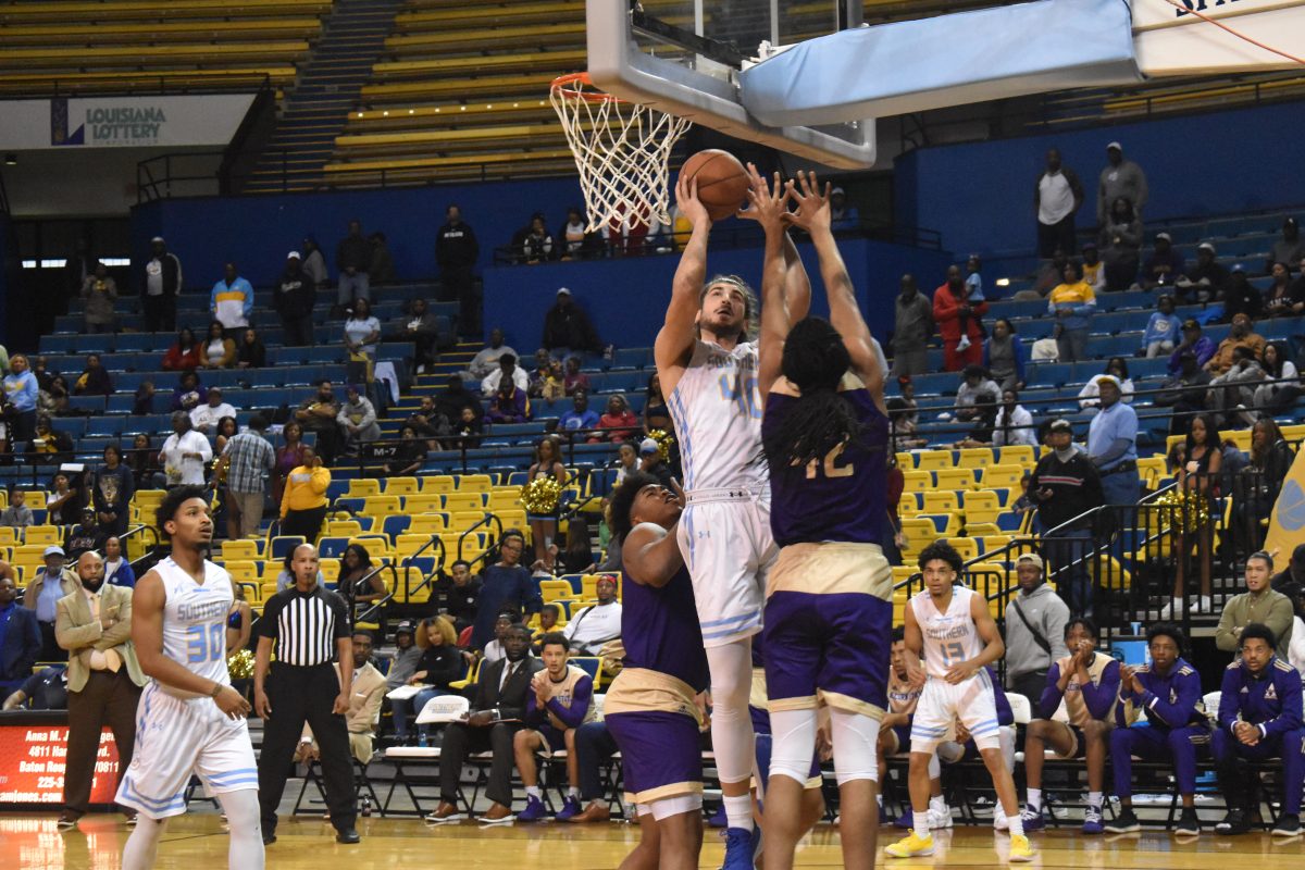 Center, Amel Kuljuhovic, scores while being guarded against two Alcorn State defensive players in the Men&#8217;s SWAC Matchup against Alcorn State at the F.G. Clark Activity Center, February 2 (Tiffany Williams/DIGEST)&#160;