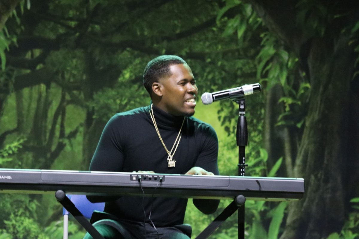 ON THE KEYS: Clifford Choates singing Ordinary People by John Legend at the Mr. Freshman Pageant held inside the University&#8217;s Event Center on February 5. (Te&#8217;yanah Owens/DIGEST)