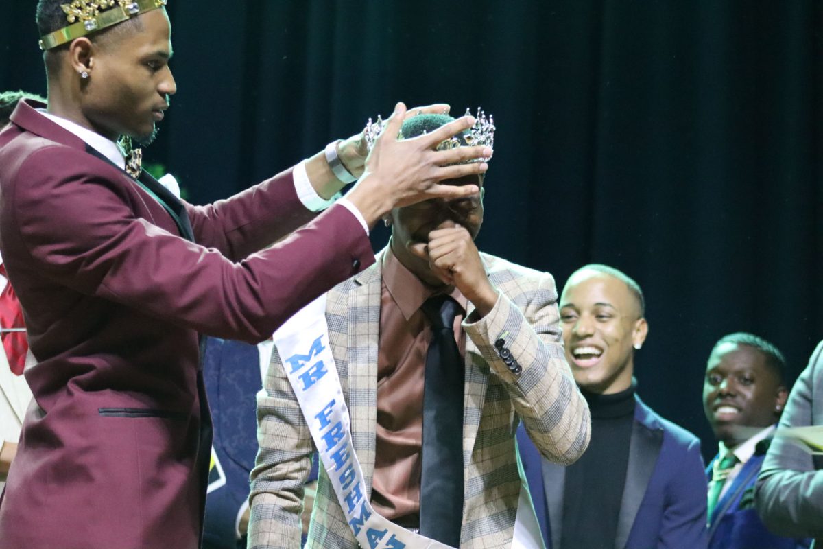 CROWNED: Students embracing Jairus Johnson for becoming the 2020 Mr. Freshman at the Mr. Freshman Pageant held inside the University&#8217;s Event Center on Wednesday, February 5. (Te&#8217;yanah Owens/DIGEST)