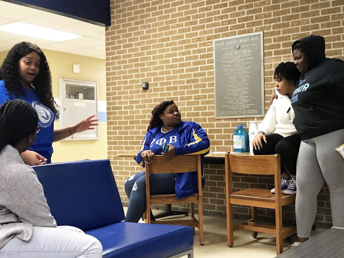 
The ladies of the Beta Alpha chapter of Zeta Phi Beta Sorority, Inc. engage in conversation at their Apollo Night held inside Boley Hall on Friday, January 31. (Te&#8217;yanah Owens/DIGEST)
