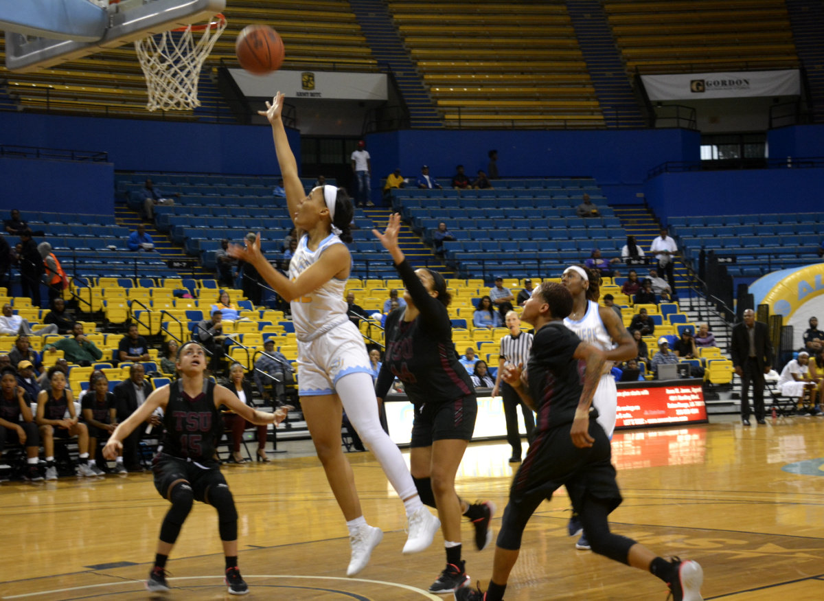 Sophomore, Forward Taneara Moore, drives through the lane for a layup in Saturday&#8217;s SWAC finale against Prairie View.&#160;&#160;