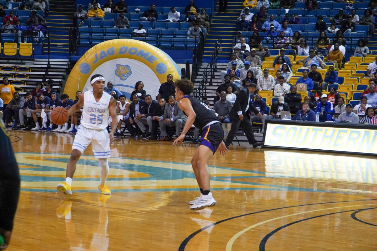 Redshirt junior, guard Brendon Brooks surveys the Panther defense while setting up the offense during the Jaguars final regular season home game against Prairieview on Saturday, March 7. Jairus Moore/ DIGEST&#160;