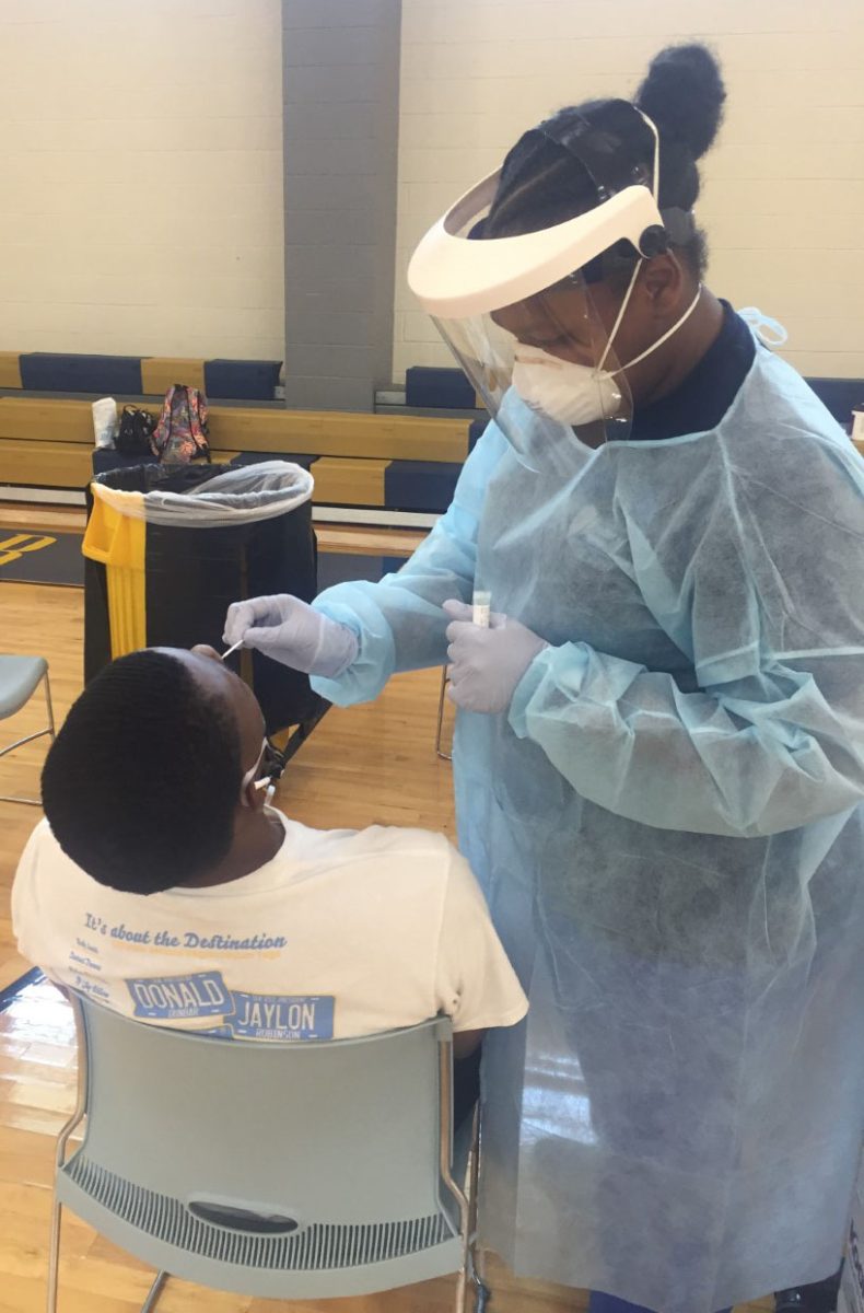 Ochsner worker administers free COVID-19 testing to SU student at the Horace W. Moody Intramural Sports Complex on August 31, 2020. (Diamond Butler/Southern Digest)