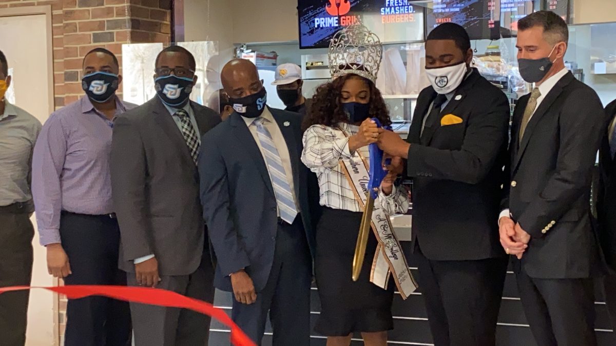 90th Miss Southern University, Kennedie Baptiste and SGA President Chandler Vadrine stand alongside Aramark Southern System District Manager, Brett Perlowski and Student Affairs Administrators during the Prime Grill Grand Opening on Tuesday, February 23. (Chris Jones/DIGEST)