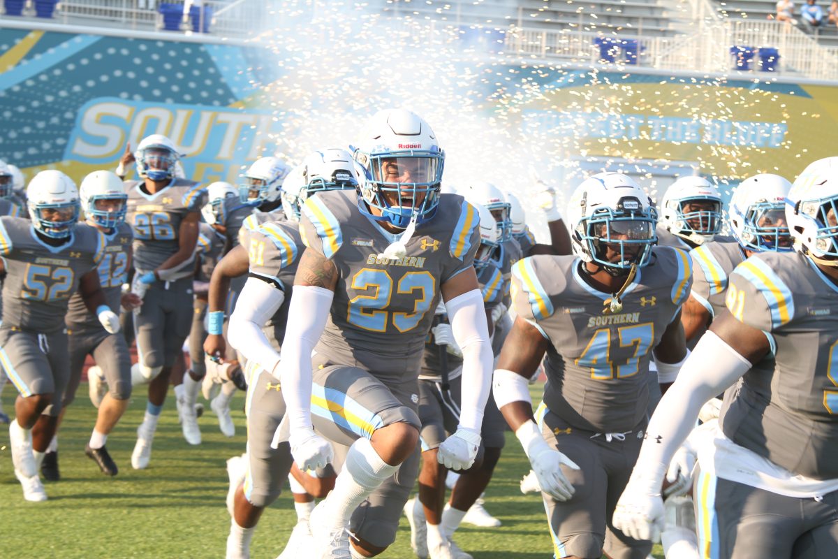 Southern University charges on to the feild vs. Miles College (Isaac Armstrong/ SouthernDigest)