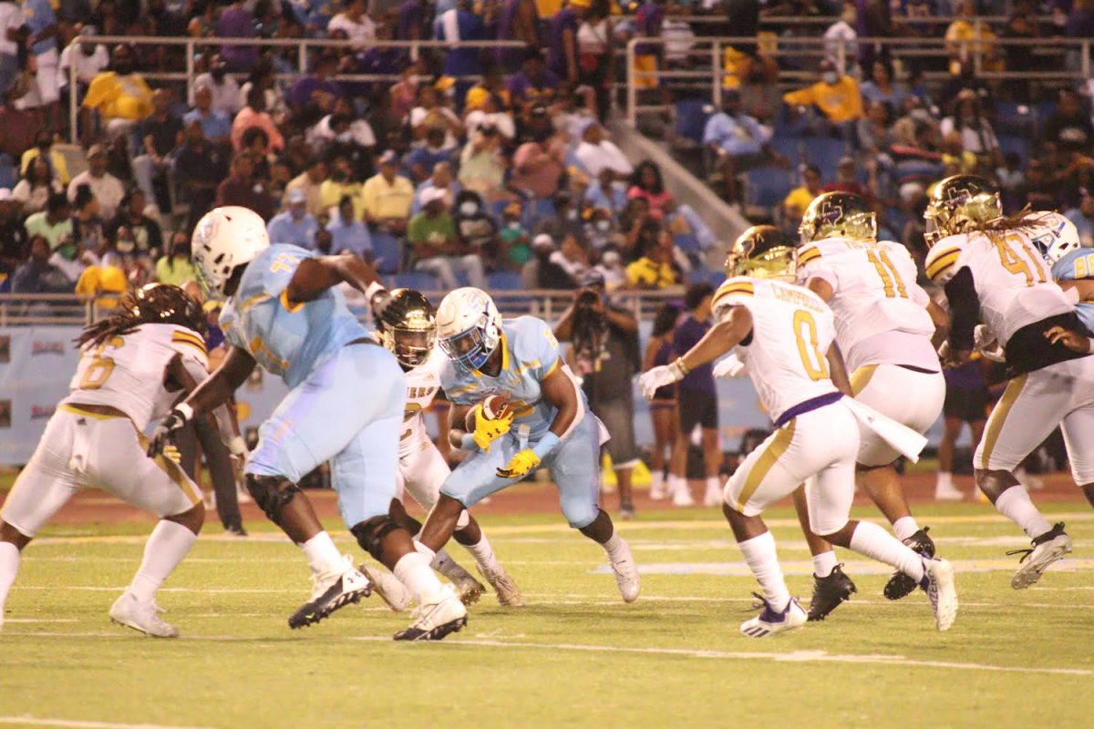 Redshirt Senior, running back Devon Benn, weaves through Prairie View's defense during the homecoming on October 23. (KALANI JONES/DIGEST)